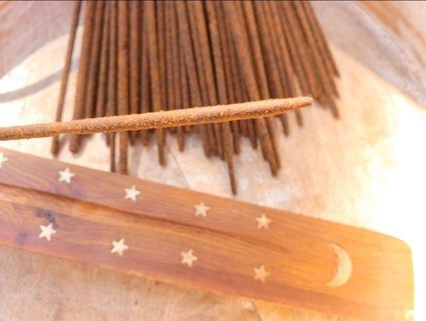 curved wood incense burner